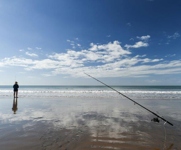 Moore park beach man fishing